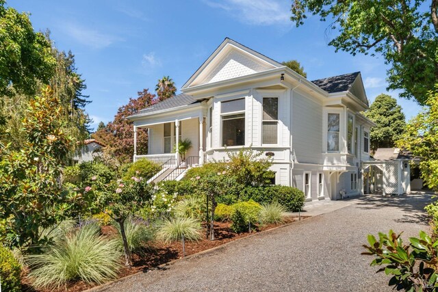 2230 1st St, Napa, CA 94559 - view of front of home featuring covered porch, driveway, a shingled roof, and stairs