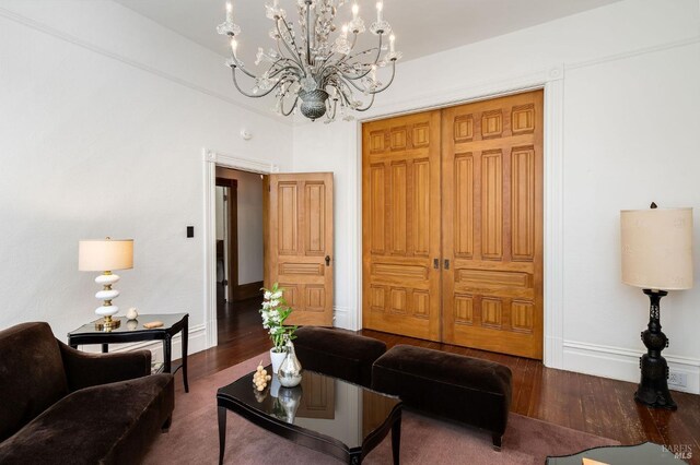 2230 1st St, Napa, CA 94559 - living area with baseboards, a chandelier, and wood finished floors