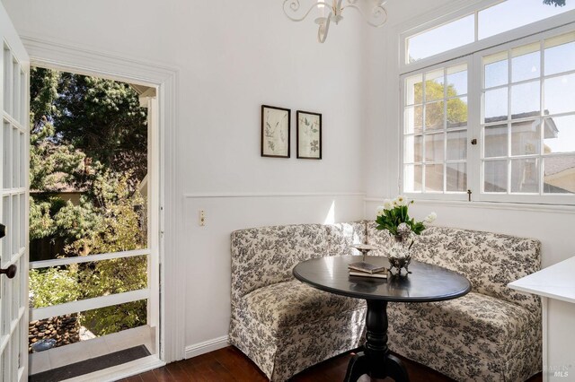 2230 1st St, Napa, CA 94559 - dining room featuring dark wood-type flooring, baseboards, and an inviting chandelier