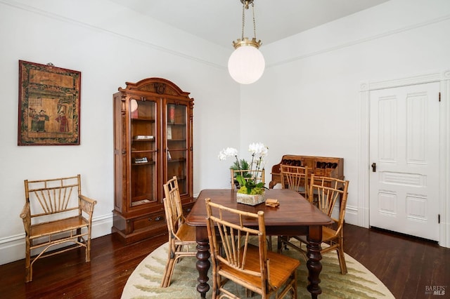 dining room featuring dark hardwood / wood-style flooring