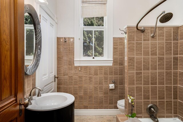 2230 1st St, Napa, CA 94559 - bathroom featuring toilet, tile walls, and plenty of natural light