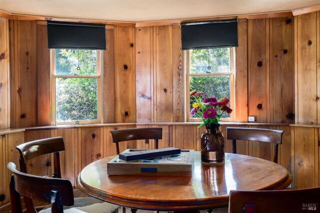 2230 1st St, Napa, CA 94559 - dining space with wood walls and a wealth of natural light