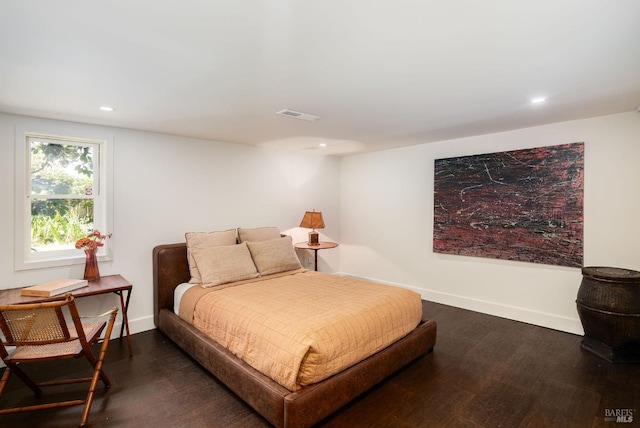 bedroom with visible vents, recessed lighting, baseboards, and dark wood-style floors