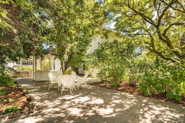 view of patio featuring outdoor dining space