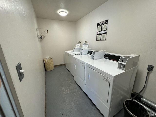 shared laundry area featuring independent washer and dryer