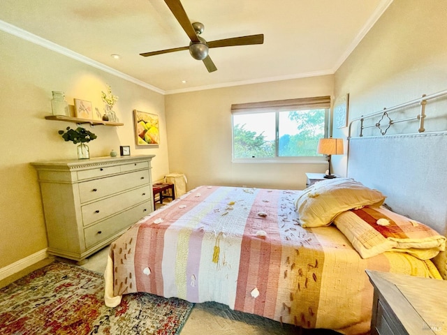 bedroom featuring ornamental molding, baseboards, and a ceiling fan