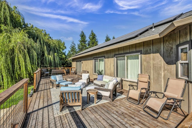 wooden deck with outdoor lounge area