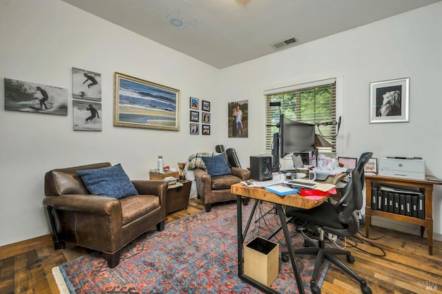 office space with dark hardwood / wood-style floors