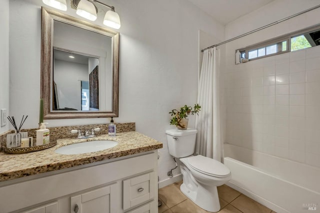 full bathroom with vanity, shower / bath combo with shower curtain, toilet, and tile patterned floors