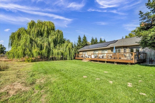 view of yard with a wooden deck