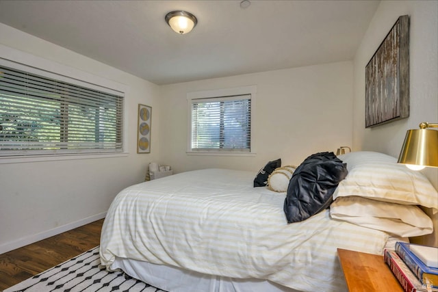 bedroom featuring wood-type flooring