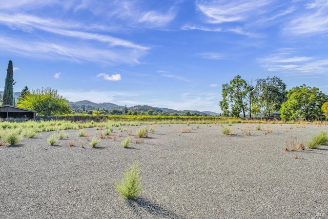 water view with a mountain view and a rural view