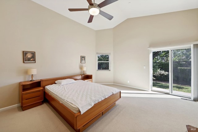 bedroom featuring ceiling fan, access to exterior, light colored carpet, and vaulted ceiling