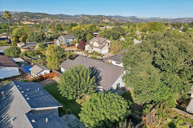 drone / aerial view featuring a mountain view