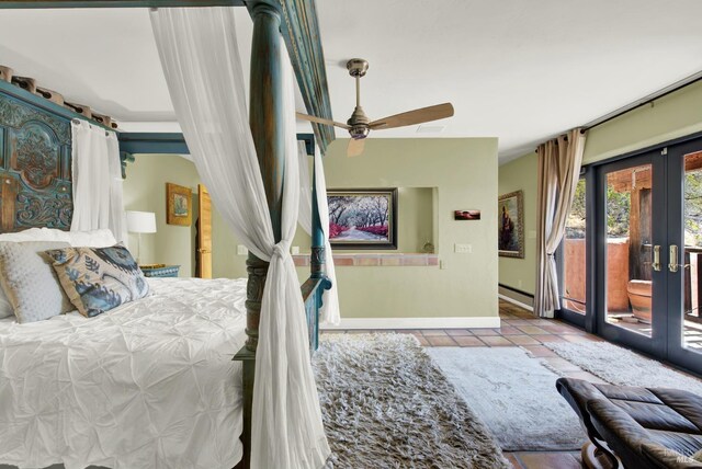 tiled bedroom featuring ceiling fan, access to exterior, and french doors