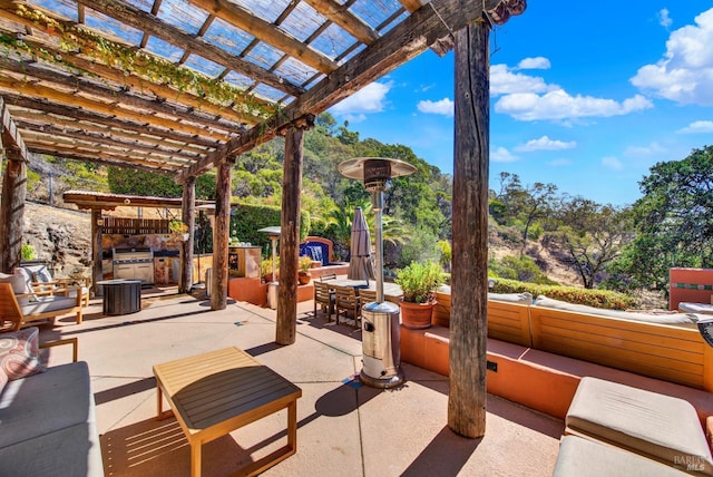 view of patio featuring a pergola and an outdoor hangout area