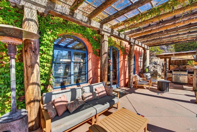 view of patio featuring an outdoor living space and a pergola