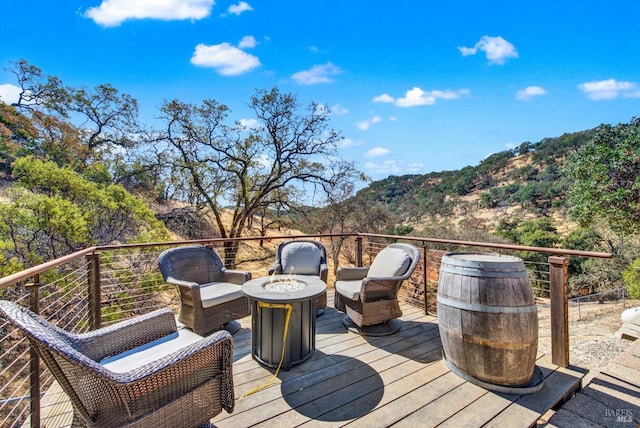 wooden terrace with a mountain view