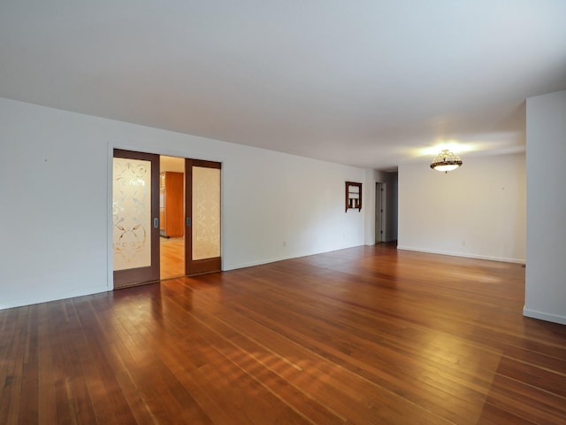 10951 River Rd, Courtland, CA 95615 - spare room featuring dark hardwood / wood-style flooring