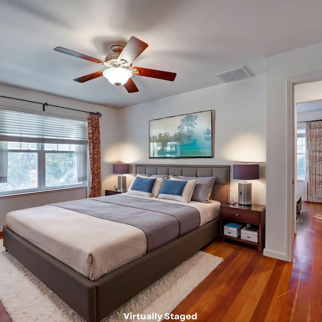 10951 River Rd, Courtland, CA 95615 - bedroom with hardwood / wood-style floors and ceiling fan