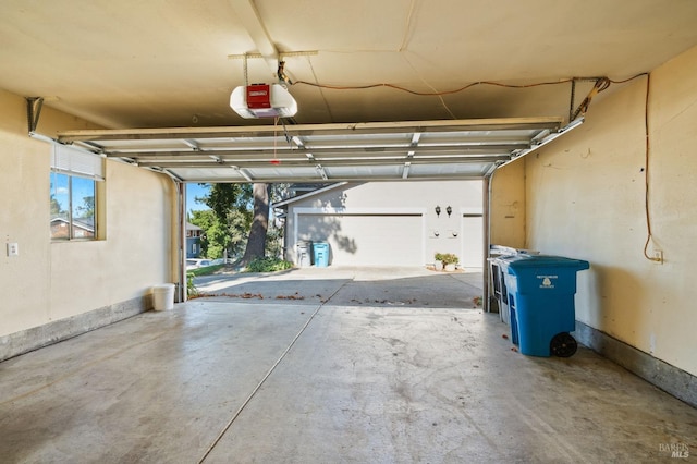 garage featuring a garage door opener