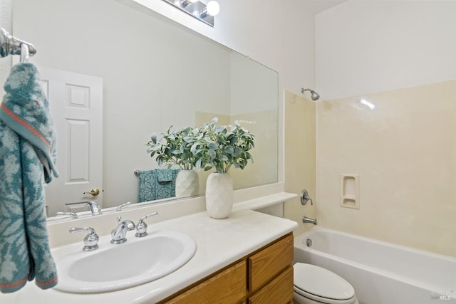 full bathroom with  shower combination, vanity, and toilet