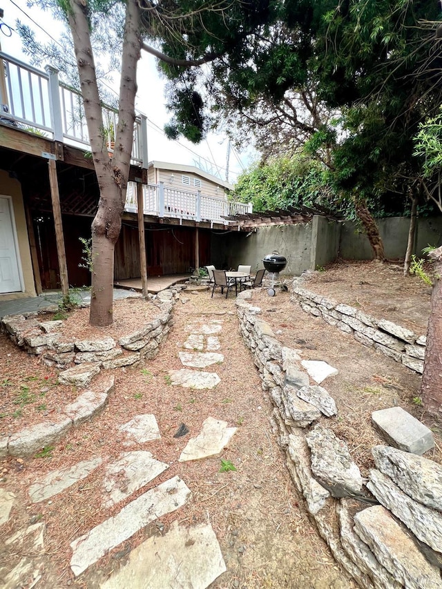 view of yard featuring a deck