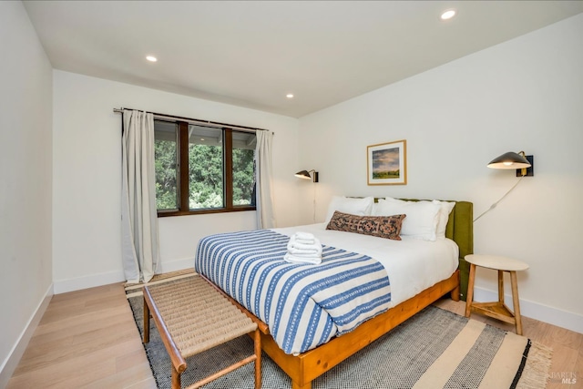 bedroom featuring light hardwood / wood-style floors