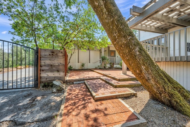 view of yard with a pergola and a patio area