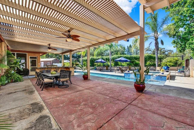 view of patio / terrace with ceiling fan and a pergola