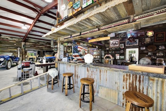 bar with concrete flooring