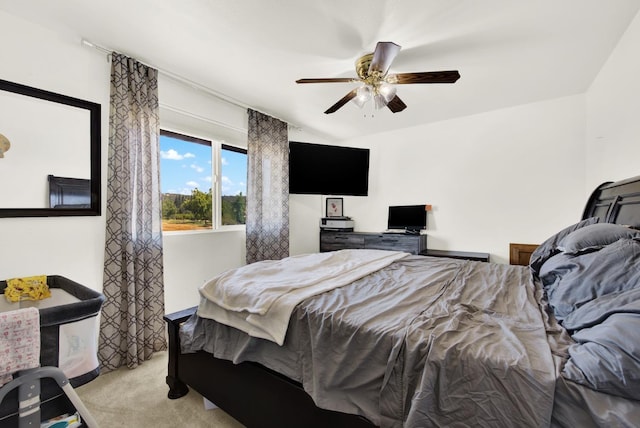 carpeted bedroom featuring ceiling fan