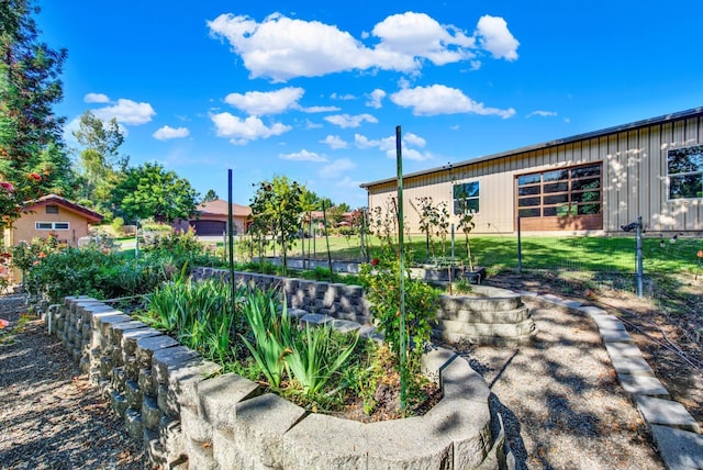 view of property's community with a lawn