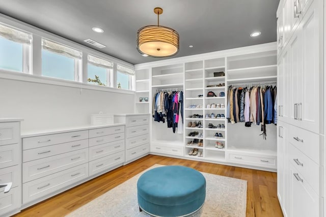 walk in closet featuring light wood-type flooring