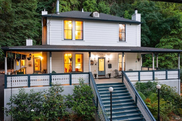12130 Hwy 116, Guerneville, CA 95446 - view of front of property with a chimney, a porch, and stairs