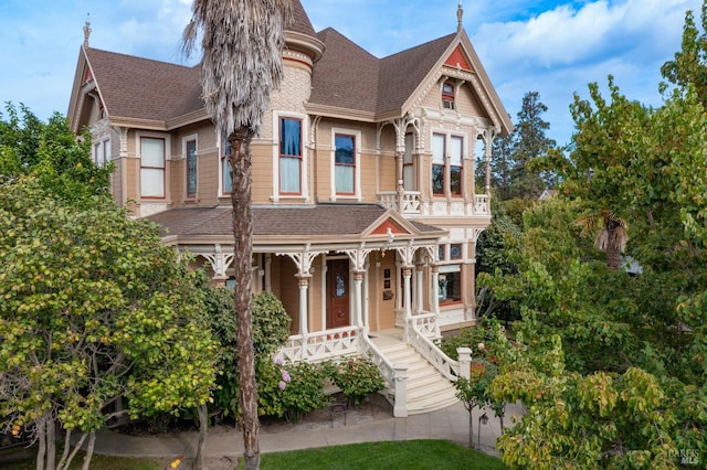 victorian-style house with a porch