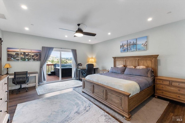 bedroom with access to exterior, dark wood-style floors, and recessed lighting