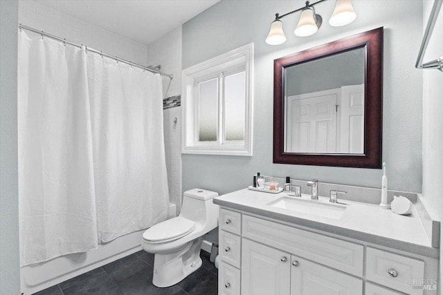 full bath featuring vanity, tile patterned flooring, toilet, and shower / tub combo with curtain