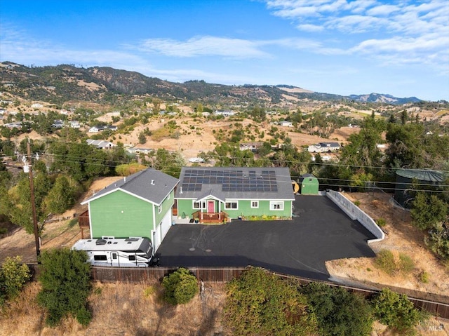 drone / aerial view featuring a mountain view