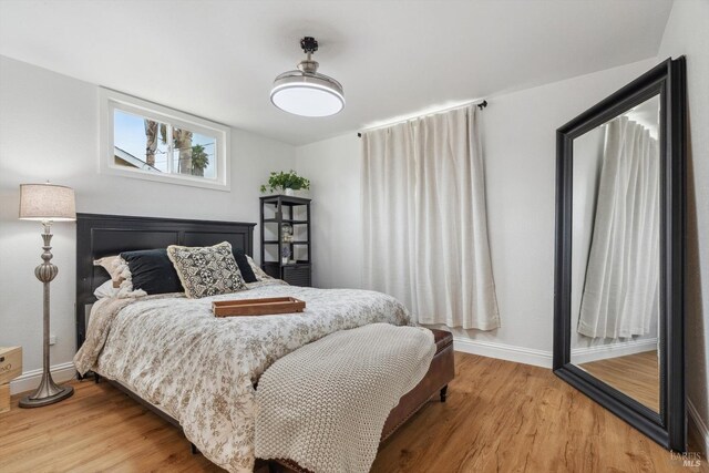 bedroom featuring hardwood / wood-style floors