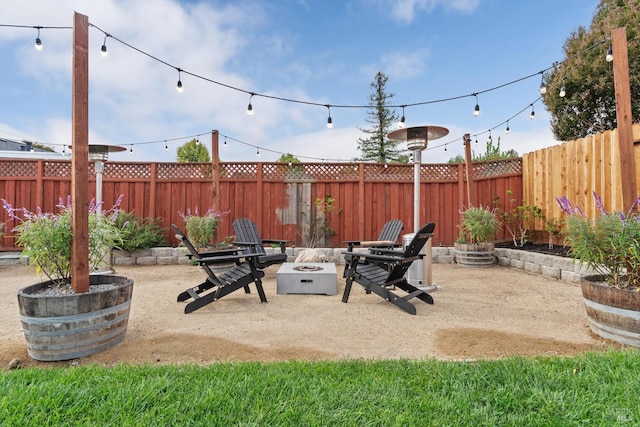 view of patio with a fire pit