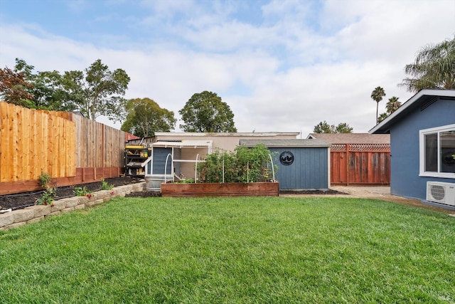 view of yard featuring ac unit and a shed