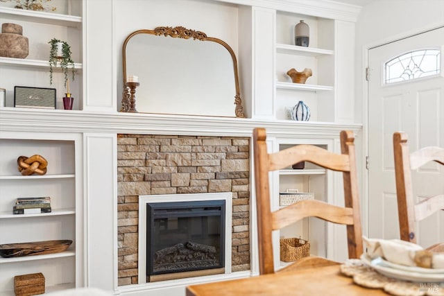 interior space featuring a stone fireplace