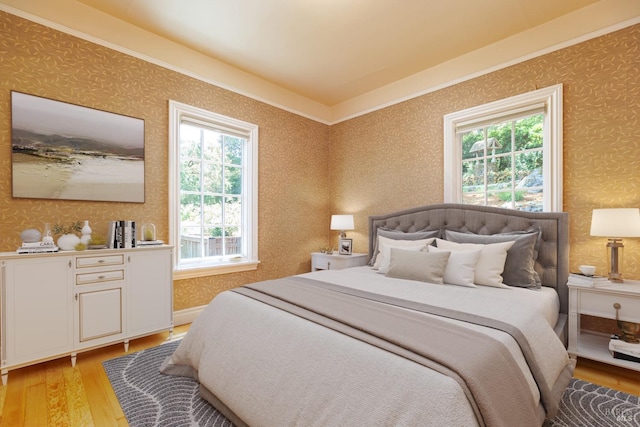 bedroom with light hardwood / wood-style flooring