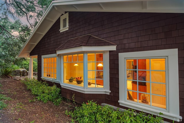 view of property exterior at dusk