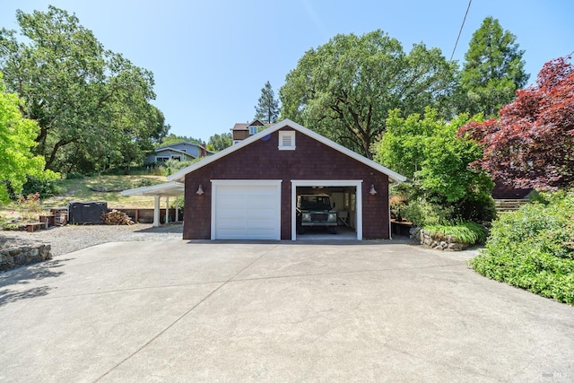 garage featuring a carport