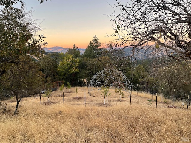 mountain view featuring a rural view