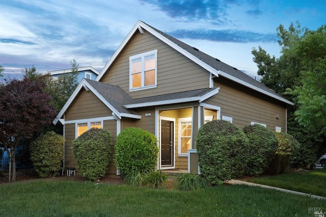 view of front of house with a front lawn