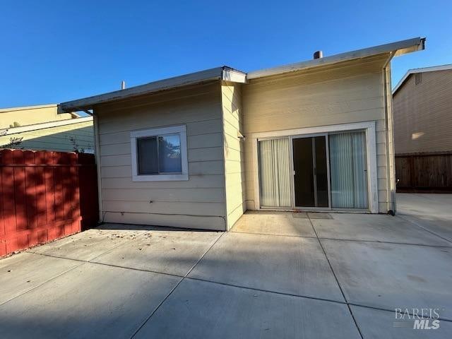 rear view of house with a patio