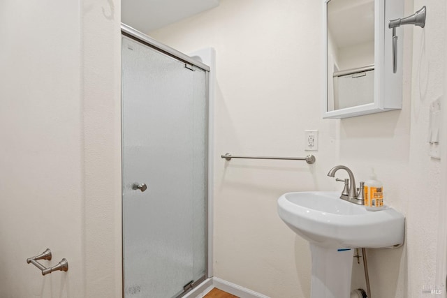 bathroom with an enclosed shower